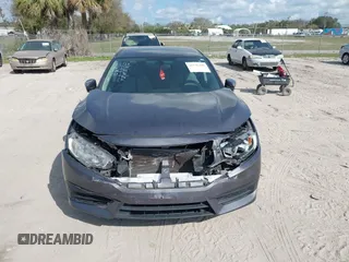 2017 Honda Civic LX with VIN 19XFC2F51HE036153, listed as a IAAI auction lot 41546498 with 78,726 mi miles and . Bid and sale history available at DreamBid. Image 12.