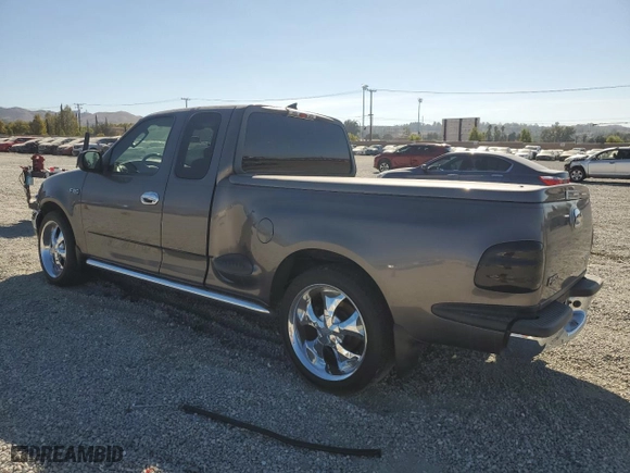 2003 Ford F-150 XL with VIN 1FTRX07233KC40260, listed as a Copart auction lot 78007404 with 85,222 mi miles and Salvage Title. Bid and sale history available at carsss.com. Image 2.