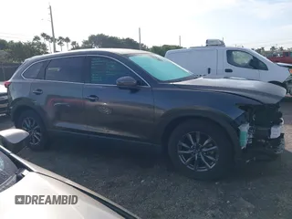 2020 Mazda CX-9 Touring z VIN JM3TCACY5L0412308, wystawiony jako IAAI lot #41208401 z przebiegiem 37 029 mil mil oraz . Historia ofert i sprzedaży dostępna na DreamBid. Obrazek 14.