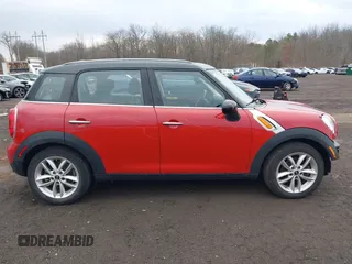 2013 MINI Cooper Countryman with VIN WMWZB3C57DWM07565, listed as a IAAI auction lot 41655938 with 62,694 mi miles. Bid and sale history available at carsss.com. Image 13.