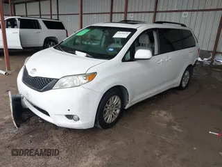2014 Toyota Sienna XLE with VIN 5TDYK3DC6ES444121, listed as a IAAI auction lot 42110190 with 240,366 mi miles and . Bid and sale history available at DreamBid. Image 16.