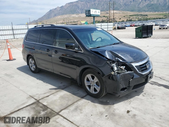 2008 Honda Odyssey Touring with VIN 5FNRL38908B092436, listed as a Copart auction lot 59914655 with 186,462 mi miles and Salvage title. Bid and sale history available at DreamBid. Image 4.