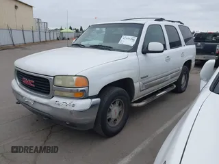 2002 GMC Yukon SLT with VIN 1GKEC13T02R313772, listed as a IAAI auction lot 42131289 with 215,164 mi miles. Bid and sale history available at carsss.com. Image 2.