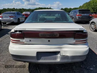 1996 Dodge Intrepid z VIN 2B3HD56F7TH146719, wystawiony jako Copart lot #68225004 z przebiegiem 61 077 mil mil oraz Szkoda całkowita • Salvage title. Historia ofert i sprzedaży dostępna na DreamBid. Obrazek 6.