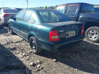 2000 Mazda Protege DX with VIN JM1BJ2229Y0235881, listed as a IAAI auction lot 41484779 with 283,054 mi miles and . Bid and sale history available at DreamBid. Image 3.