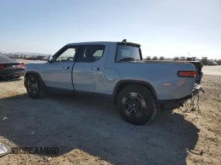 2022 Rivian R1T Adventure z VIN 7FCTGAAA0NN010103, wystawiony jako Copart lot #53312035 z przebiegiem 48 333 mil mil oraz Szkody całkowita. Historia ofert i sprzedaży dostępna na DreamBid. Obrazek 2.