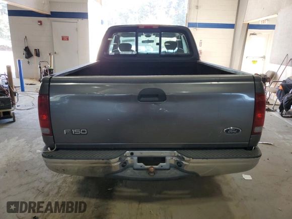2003 Ford F-150 XL with VIN 1FTRX17263NA82310, listed as a Copart auction lot 76577354 with Not provided miles and Salvage title. Bid and sale history available at DreamBid. Image 6.