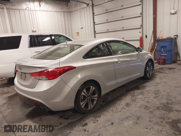 2013 Hyundai Elantra Coupe SE with VIN KMHDH6AEXDU022783, listed as a IAAI auction lot 41595832 with 153,330 mi miles. Bid and sale history available at carsss.com. Image 4.