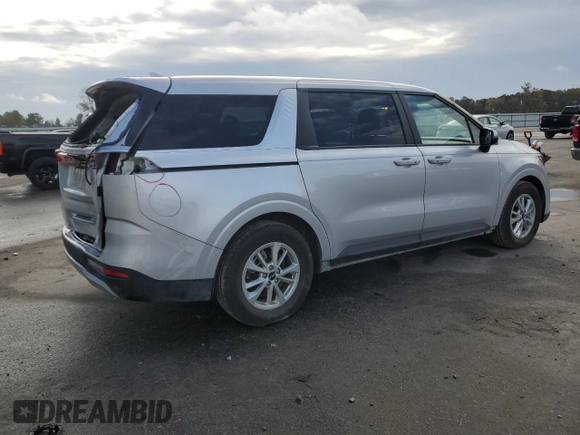 2023 Kia Carnival LX with VIN KNDNB4H32P6191059, listed as a Copart auction lot 79924394 with 28,760 mi miles and Salvage Title. Bid and sale history available at carsss.com. Image 3.