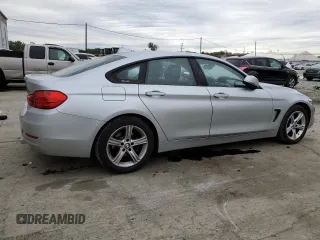 2015 BMW 4 Series 428i xDrive with VIN WBA4C9C5XFG135391, listed as a Copart auction lot 70753653 with 70,870 mi miles and . Bid and sale history available at DreamBid. Image 3.