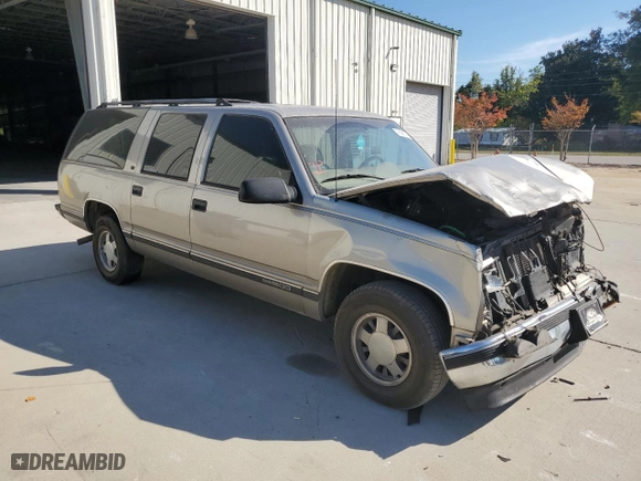 1999 GMC Suburban with VIN 3GKEC16R7XG542862, listed as a Copart auction lot 77568734 with 251,717 mi miles and Salvage Title. Bid and sale history available at carsss.com. Image 4.