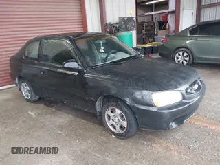 2001 Hyundai Accent GL with VIN KMHCG35C81U090873, listed as a IAAI auction lot 41436739 with 59,359 mi miles. Bid and sale history available at carsss.com. Image 1.