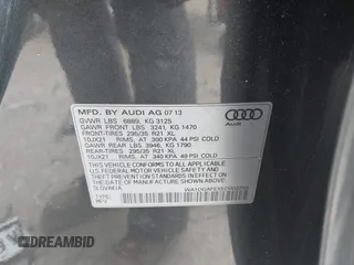 2014 Audi Q7 3.0T S line Prestige with VIN WA1DGAFEXED003259, listed as a IAAI auction lot 41624351 with 104,938 mi miles. Bid and sale history available at carsss.com. Image 9.