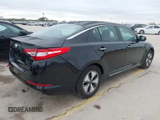 2012 Kia Optima Hybrid with VIN KNAGM4AD8C5021615, listed as a IAAI auction lot 41216697 with 119,153 mi miles. Bid and sale history available at carsss.com. Image 4.