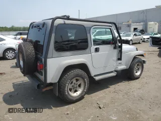 2005 Jeep Wrangler Sport с VIN 1J4FA49SX5P317067, выставлен на аукционе Copart как лот 60627125 с пробегом 170 700 миль миль и Чистый • Clean title. История ставок и продаж доступна на DreamBid. Изображение 3.