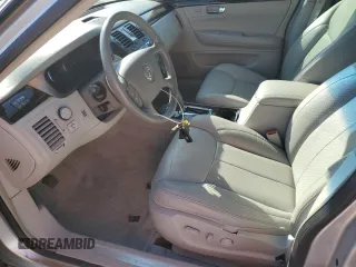 2010 Cadillac DTS w/1SC with VIN 1G6KD5EYXAU126775, listed as a Copart auction lot 77207094 with 100,288 mi miles and Salvage Title. Bid and sale history available at carsss.com. Image 7.