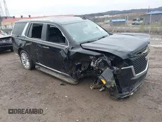2024 Cadillac Escalade Luxury z VIN 1GYS4AKLXRR116951, wystawiony jako IAAI lot #42007285 z przebiegiem 46 101 mil mil oraz . Historia ofert i sprzedaży dostępna na DreamBid. Obrazek 1.