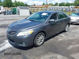 2010 Toyota Camry with VIN 4T1BF3EK4AU107464, listed as a IAAI auction lot 42244225 with 288,367 mi miles and . Bid and sale history available at DreamBid. Image 2.