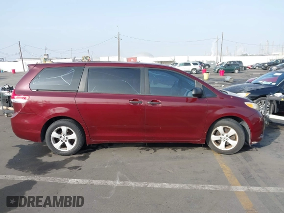 2011 Toyota Sienna with VIN 5TDZK3DCXBS157316, listed as a IAAI auction lot 41240896 with 117,437 mi miles. Bid and sale history available at carsss.com. Image 13.