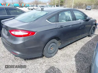 2016 Ford Fusion S z VIN 3FA6P0G79GR152156, wystawiony jako IAAI lot #41958709 z przebiegiem 204 668 mil mil oraz . Historia ofert i sprzedaży dostępna na DreamBid. Obrazek 4.