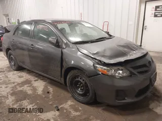 2012 Toyota Corolla L with VIN 5YFBU4EE9CP047479, listed as a IAAI auction lot 41727512 with 128,970 mi miles. Bid and sale history available at carsss.com. Image 1.