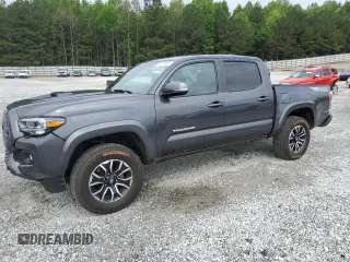 2023 Toyota Tacoma SR z VIN 3TMCZ5AN0PM611423, wystawiony jako Copart lot #55250085 z przebiegiem 34 319 mil mil oraz Szkoda całkowita • Salvage title. Historia ofert i sprzedaży dostępna na DreamBid. Obrazek 1.