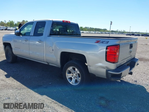 2018 Chevrolet Silverado 1500 LT with VIN 1GCVKREC9JZ335603, listed as a IAAI auction lot 41853399 with 152,460 mi miles and . Bid and sale history available at DreamBid. Image 3.