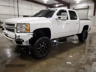 2012 Chevrolet Silverado 1500 LT with VIN 3GCPKSE72CG237017, listed as a Copart auction lot 49901985 with 236,101 mi miles and Salvage Title. Bid and sale history available at DreamBid. Image 1.