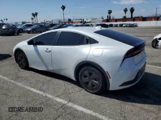 2023 Toyota Prius LE z VIN JTDACAAUXP3013799, wystawiony jako Copart lot #54194645 z przebiegiem 29 390 mil mil oraz Szkoda całkowita • Salvage title. Historia ofert i sprzedaży dostępna na DreamBid. Obrazek 2.