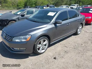 2013 Volkswagen Passat SEL Premium with VIN 1VWCM7A34DC055684, listed as a IAAI auction lot 42039636 with 167,746 mi miles. Bid and sale history available at carsss.com. Image 2.