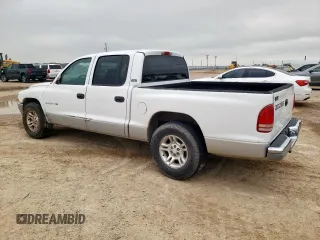 2001 Dodge Dakota Sport z VIN 1B7GL2AN51S118157, wystawiony jako Copart lot #58797325 z przebiegiem 147 765 mil mil oraz Szkoda całkowita • Salvage title. Historia ofert i sprzedaży dostępna na DreamBid. Obrazek 2.