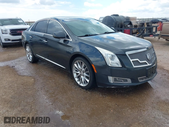 2013 Cadillac XTS Platinum z VIN 2G61V5S32D9102537, wystawiony jako IAAI lot #42230895 z przebiegiem 120 810 mil mil oraz . Historia ofert i sprzedaży dostępna na DreamBid. Obrazek 1.