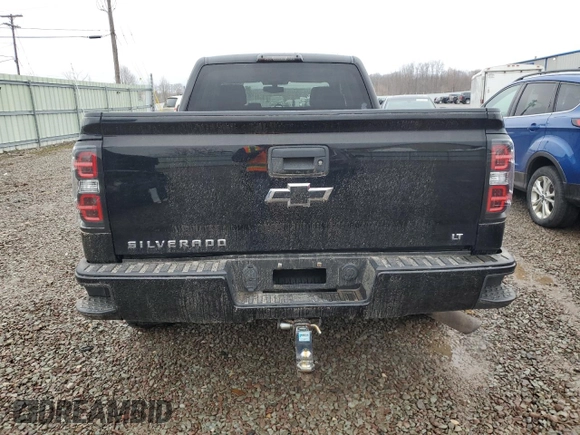 2017 Chevrolet Silverado 1500 LT with VIN 1GCVKREC1HZ315310, listed as a Copart auction lot 52013545 with 134,883 mi miles and Salvage Title. Bid and sale history available at DreamBid. Image 6.