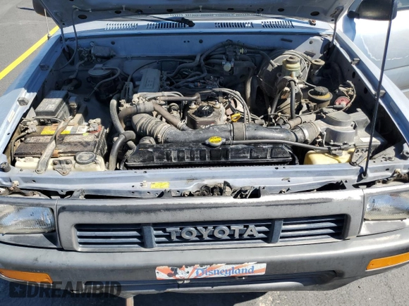 1991 Toyota Pickup z VIN JT4RN13PXM6031833, wystawiony jako Copart lot #58953095 z przebiegiem 252 237 mil mil oraz Czysty tytuł • Clean title. Historia ofert i sprzedaży dostępna na DreamBid. Obrazek 11.