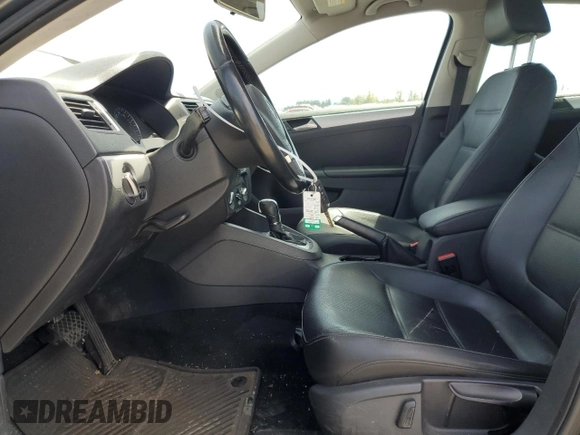 2013 Volkswagen Jetta SE with VIN 3VWDP7AJXDM281723, listed as a Copart auction lot 57235725 with 128,157 mi miles and Salvage title. Bid and sale history available at DreamBid. Image 7.