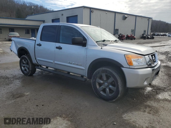 2015 Nissan Titan Pro-4X with VIN 1N6AA0EC1FN512072, listed as a Copart auction lot 85733174 with 92,460 mi miles and Salvage title. Bid and sale history available at DreamBid. Image 4.