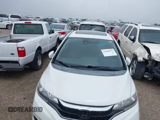 2019 Honda Fit EX with VIN 3HGGK5H81KM705598, listed as a IAAI auction lot 41889932 with 94,096 mi miles and . Bid and sale history available at DreamBid. Image 2.