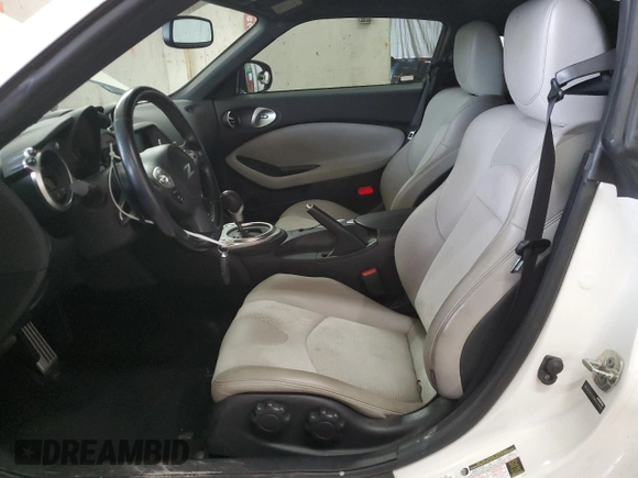 2013 Nissan 370Z Touring z VIN JN1AZ4EH5DM383466, wystawiony jako Copart lot #85704054 z przebiegiem 37 892 mil mil oraz Szkoda całkowita • Salvage title. Historia ofert i sprzedaży dostępna na DreamBid. Obrazek 7.