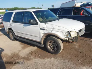 1999 Ford Expedition XLT with VIN 1FMRU1761XLA56030, listed as a IAAI auction lot 42703533 with Not provided miles and . Bid and sale history available at DreamBid. Image 1.