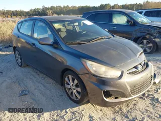 2012 Hyundai Accent SE with VIN KMHCU5AE6CU024465, listed as a IAAI auction lot 41591162 with 168,574 mi miles. Bid and sale history available at carsss.com. Image 1.