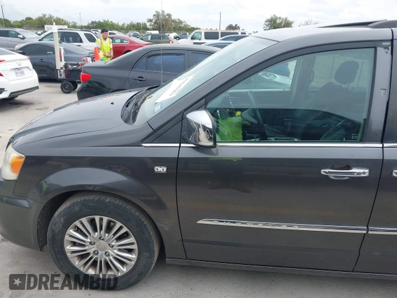 2014 Chrysler Town & Country Touring L with VIN 2C4RC1CG7ER300693, listed as a IAAI auction lot 41849463 with 174,203 mi miles and . Bid and sale history available at carsss.com. Image 19.