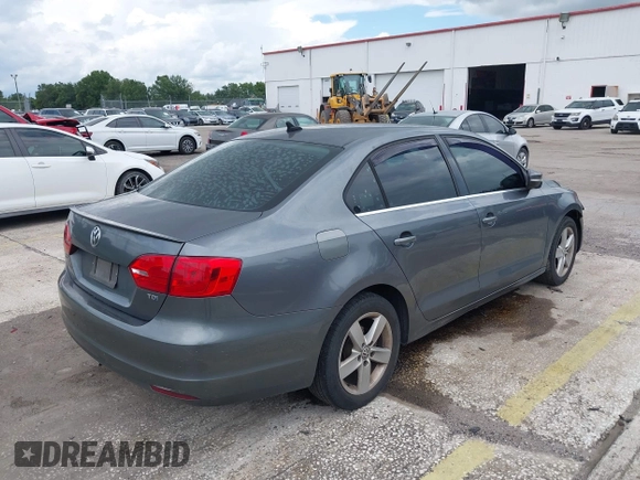 2013 Volkswagen Jetta TDI w/Premium with VIN 3VWLL7AJ4DM351806, listed as a IAAI auction lot 42654515 with 146,910 mi miles and . Bid and sale history available at DreamBid. Image 4.