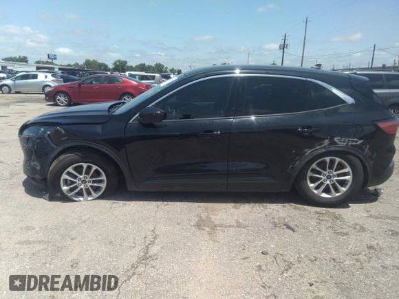 2020 Ford Escape SE with VIN 1FMCU0G61LUB77189, listed as a IAAI auction lot 42223410 with 101,407 mi miles and . Bid and sale history available at DreamBid. Image 14.
