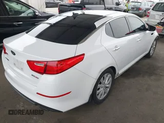 2015 Kia Optima EX z VIN 5XXGN4A71FG504390, wystawiony jako IAAI lot #42449045 z przebiegiem 171 352 mil mil oraz . Historia ofert i sprzedaży dostępna na DreamBid. Obrazek 4.