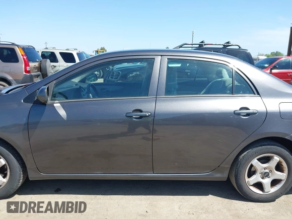 2012 Toyota Corolla L with VIN 5YFBU4EEXCP054988, listed as a IAAI auction lot 41973361 with 193,390 mi miles. Bid and sale history available at carsss.com. Image 14.