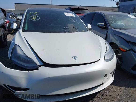 2021 Tesla Model 3 Standard Range Plus z VIN 5YJ3E1EA8MF100456, wystawiony jako IAAI lot #42100840 z przebiegiem 64 389 mil mil oraz . Historia ofert i sprzedaży dostępna na DreamBid. Obrazek 11.