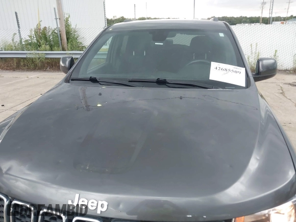 2017 Jeep Grand Cherokee Laredo with VIN 1C4RJFAG1HC604461, listed as a IAAI auction lot 42685509 with 143,462 mi miles and . Bid and sale history available at DreamBid. Image 6.