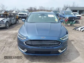 2018 Ford Fusion Energi SE with VIN 3FA6P0PU0JR196091, listed as a IAAI auction lot 42017867 with 70,284 mi miles. Bid and sale history available at carsss.com. Image 12.