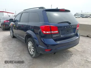 2017 Dodge Journey SXT z VIN 3C4PDDBG4HT574281, wystawiony jako IAAI lot #42273583 z przebiegiem 155 611 mil mil oraz . Historia ofert i sprzedaży dostępna na DreamBid. Obrazek 3.