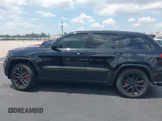 2021 Jeep Grand Cherokee Laredo E with VIN 1C4RJEAG7MC844473, listed as a IAAI auction lot 42319716 with 90,449 mi miles and . Bid and sale history available at DreamBid. Image 15.